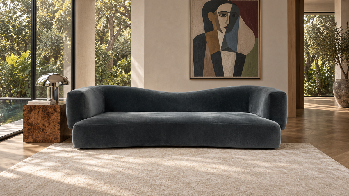 La Vague curved sofa in Abysse petrol blue velvet, three seater, in a Dubai villa living room, by Saint Objets